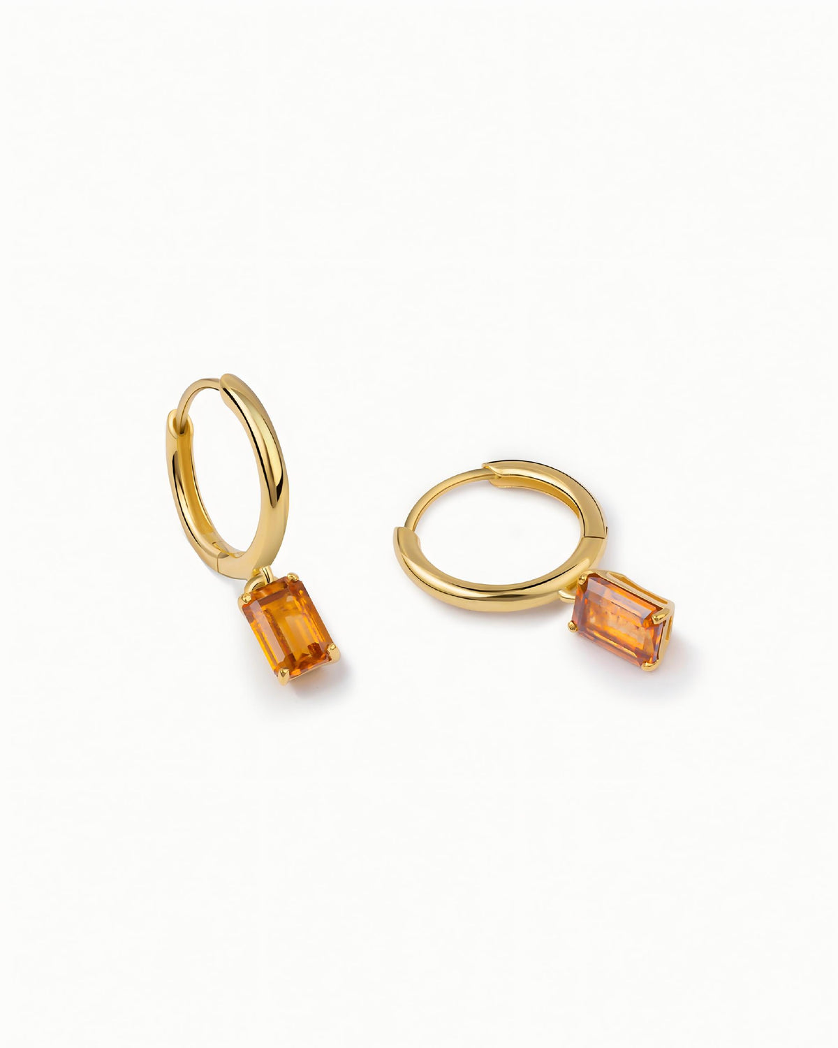 Emerald Cut Huggie Earrings In Sterling Silver